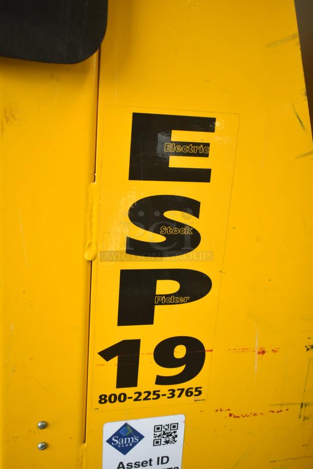 Bil Jax ESP-19 Haulotte 450 lb capacity man lift with visible label indicating model and contact number.