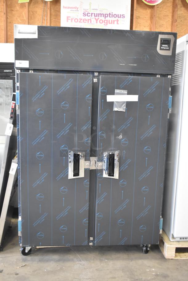 Brand new Delfield 6051XL-S commercial two-door reach-in cooler. Scratch and dent condition, on casters, 115V, 1 phase.