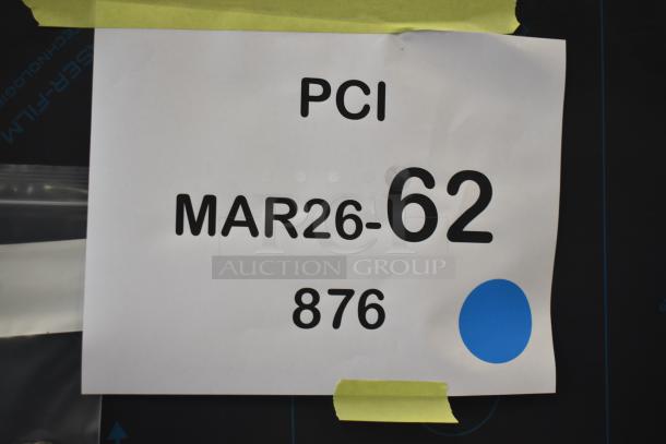 Alt text: "Tag on 2026 Delfield 6051XL-S Commercial Cooler, 'PCI MAR26-62, 876' indicating scratch and dent condition."