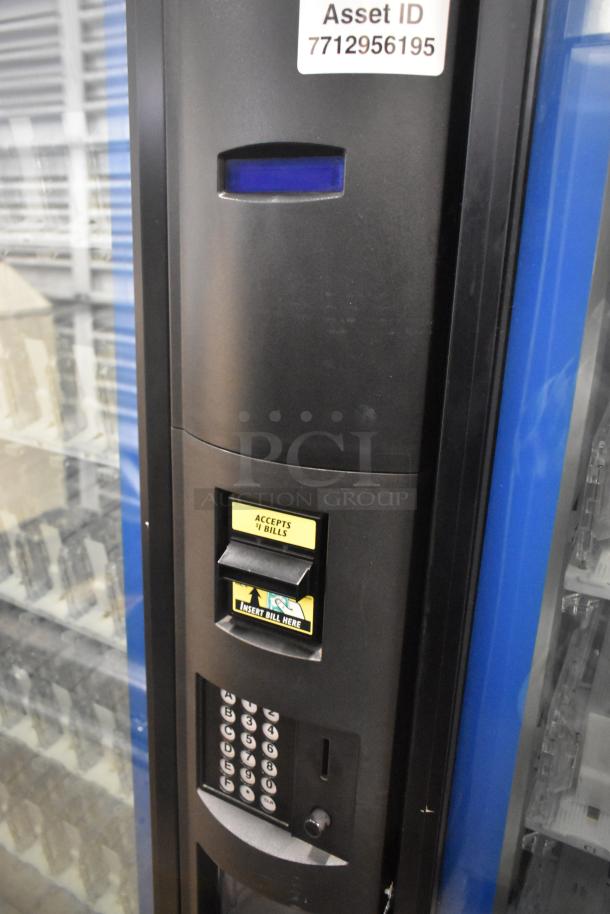 Crane 5800-4 metal drink vending machine with bill acceptor, keypad, and asset ID tag. 115 volts, 1 phase.