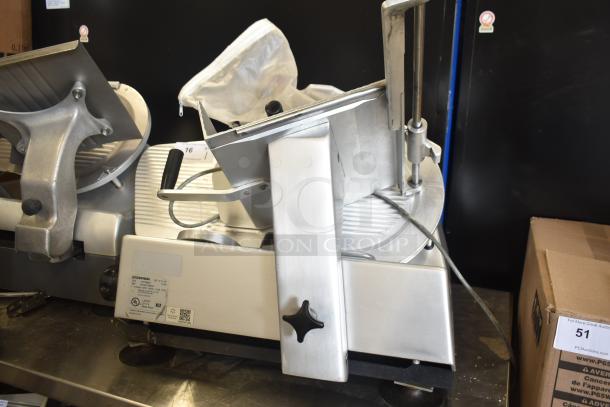 Bizerba SE 12 D US commercial meat slicer with blade sharpener, 120 volts, 1 phase, stainless steel, good condition.