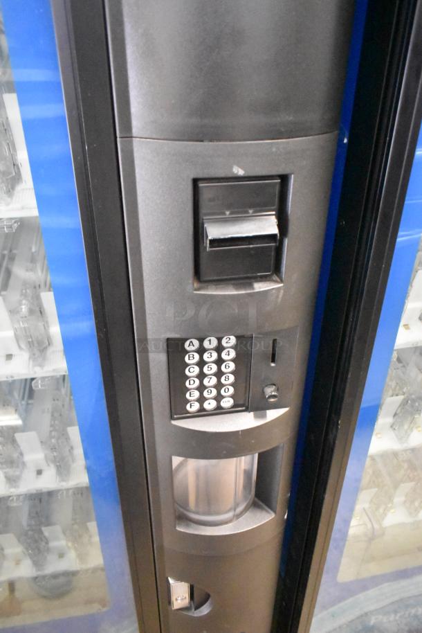 Crane 5800-4 metal commercial drink vending machine with bill acceptor, keypad, and visible bottle slots, 115V, 1 Phase.