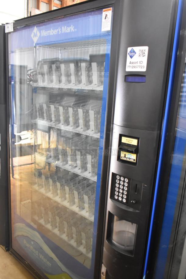 Crane 5800-4 metal vending machine, accepts bills, 115V, 1 phase, multiple slots, visible control panel, Asset ID sticker.