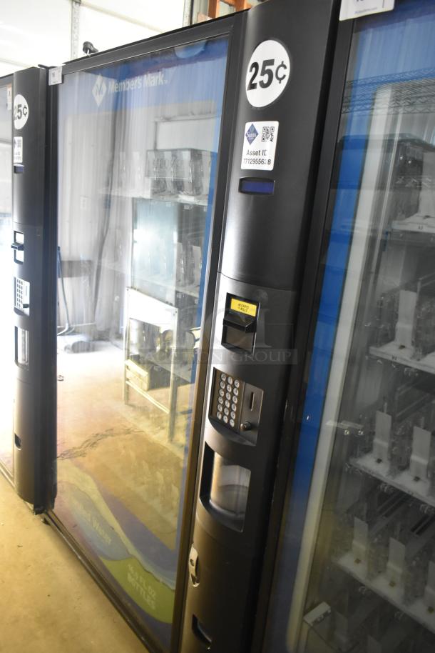 Crane 5800-4 metal commercial vending machine with bill acceptor, 115 volts, 1 phase, visible keypad, 25¢ label.