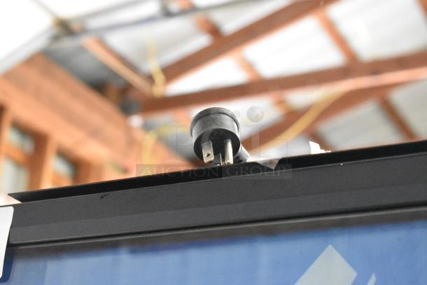 Crane 5800-4 commercial vending machine, metal, bill acceptor, 115V, 1 phase, visible power plug on top.