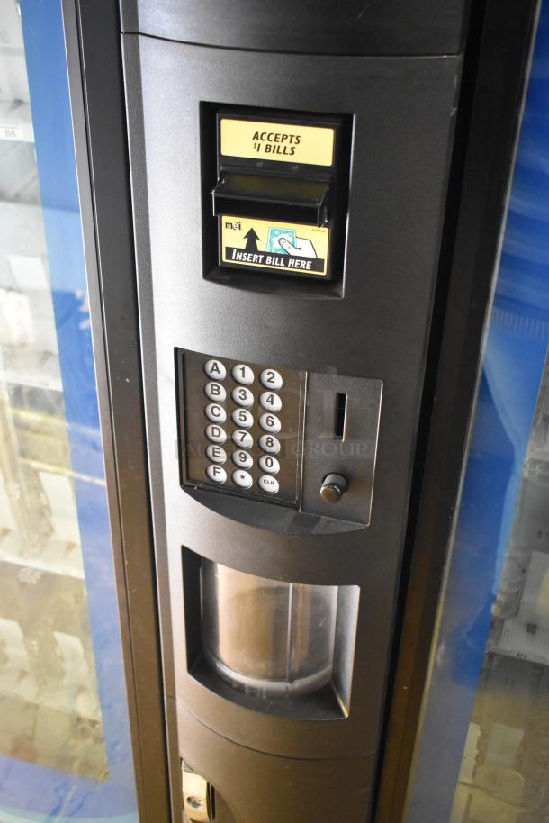 Crane 5800-4 metal vending machine, bill acceptor, keypad visible, commercial use, 115 volts, 1 phase.