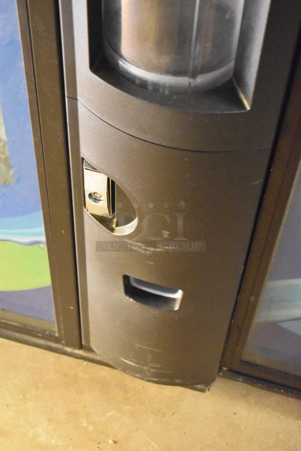 Crane 5800-4 vending machine with bill acceptor, metal finish, commercial use, 115 volts, 1 phase, visible wear.