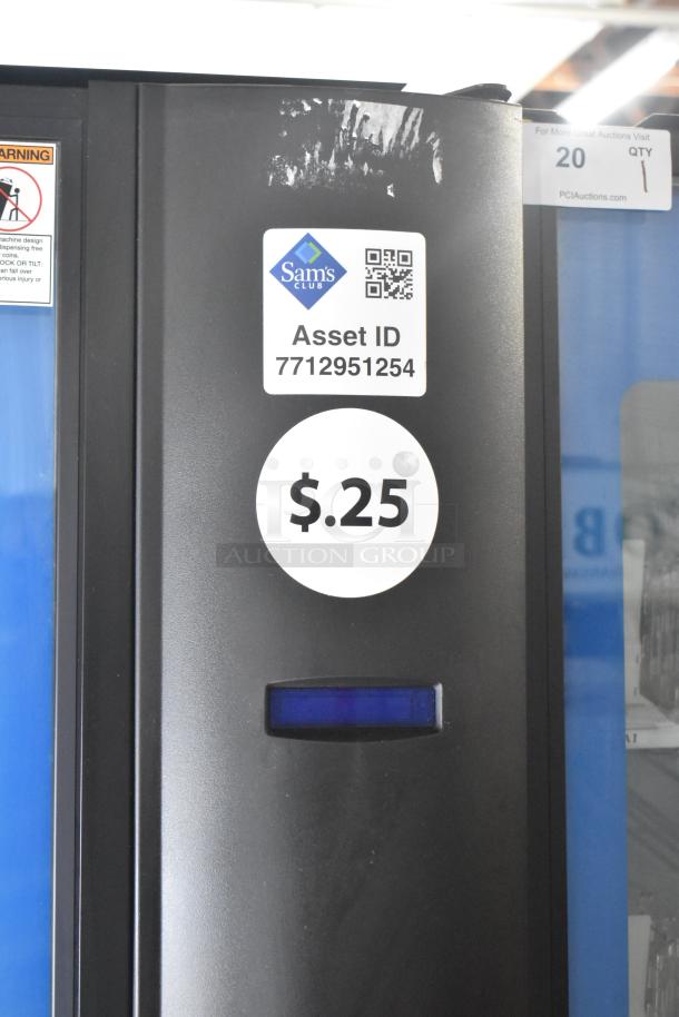 Crane 5800-4 metal commercial drink vending machine with bill acceptor. Asset ID 7712951254; Sam's Club sticker; $0.25 price label.