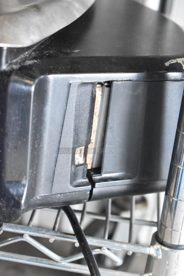 2016 Hobart HTi-7LH Commercial Scale, tested and working, 120/208-240V, shown from side, black casing detail.