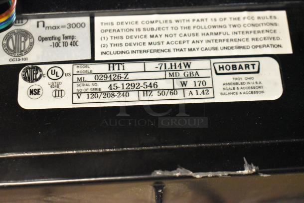 2024 Hobart HTi-7LH4W countertop scale, screen damage, missing button. Tested working, 120/208-240V, 1 phase.