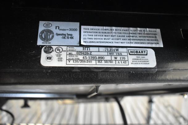 2024 Hobart HTi-7LH4W commercial scale, screen damage, missing left button, 120/208-240V, tested, model and labels shown.