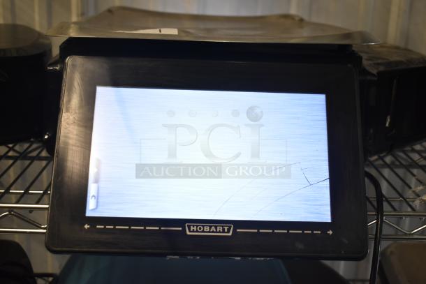2017 Hobart HTi-7LH26 commercial countertop scale with digital display, tested and working. Black casing, 120/208-240V, 1 phase.