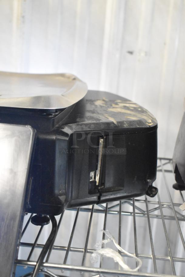 2017 Hobart HTi-7LH26 commercial countertop scale, black housing, tested and working, visible wear on top surface.