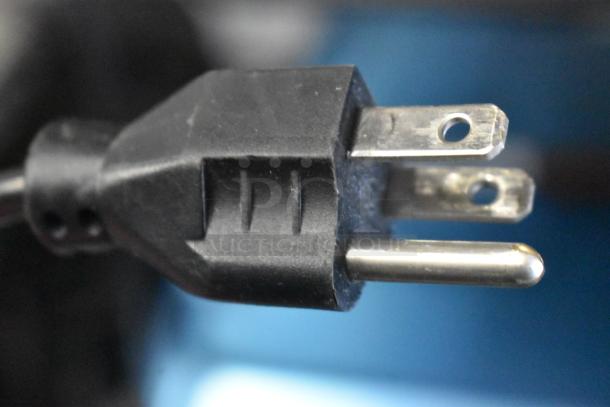 Alt text: Close-up of a power plug for the 2017 Hobart HTi-7LH26 commercial countertop scale. 120/208-240 Volts, 1 Phase.