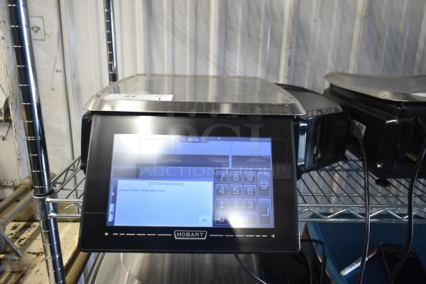 2017 Hobart HTi-7LH26 commercial countertop scale, touchscreen display, tested and working, 120/208-240 volts, 1 phase.