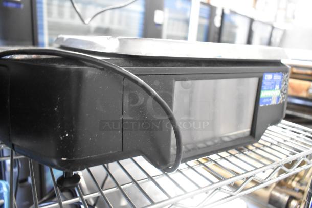 2017 Hobart HTi-7LH26 commercial countertop scale, black, tested and working, with digital display, 120/208-240V compatibility.