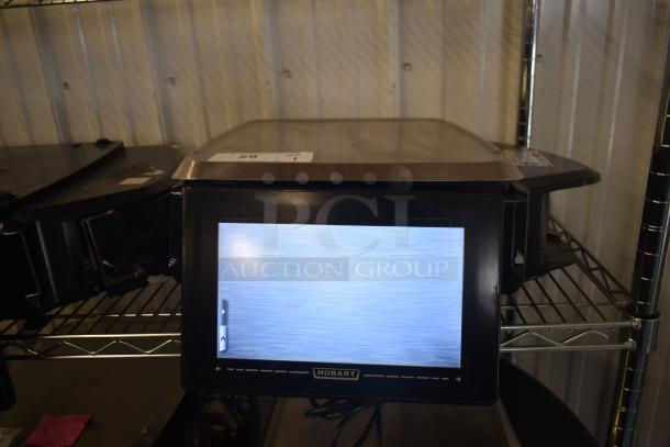 2016 Hobart HTi-7LH commercial countertop scale on a shelf, missing power cord and back right leg. Tested, working condition.