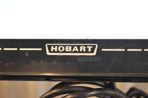2016 Hobart HTi-7LH commercial scale, missing power cord and back right leg. Tested, working condition. 120/208-240V, 1 Phase.