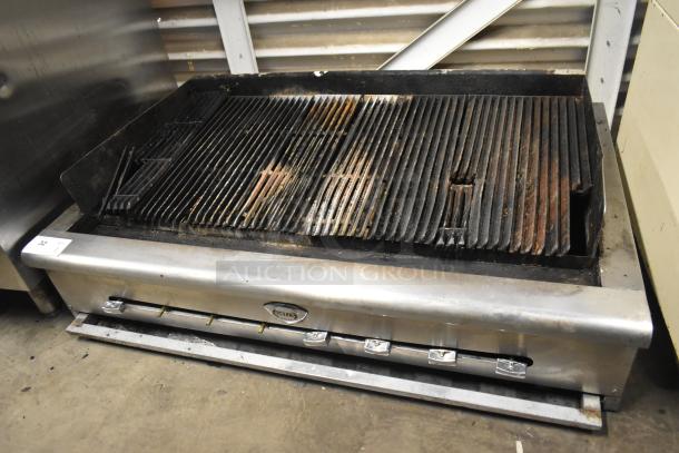Wells Commercial Countertop Gas Charbroiler Grill, stainless steel, visible wear, adjustable knobs, ideal for restaurant use.
