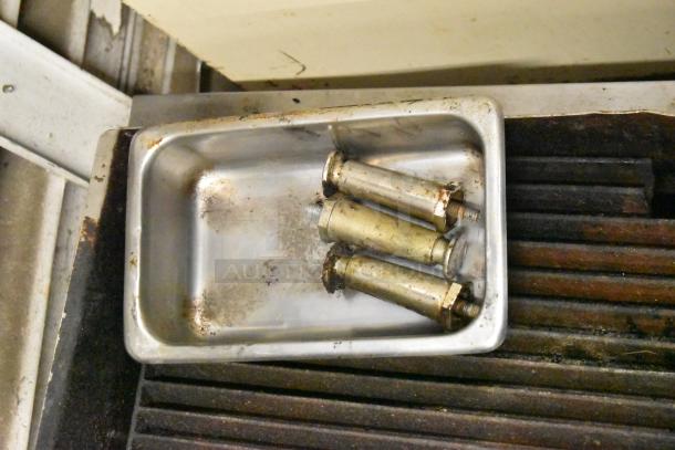 Wells Commercial Countertop Gas Charbroiler Grill in used condition, featuring metal grill grates and stainless components.