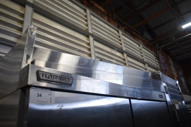 Hobart DA2 Commercial 2 Door Reach-In Cooler, stainless steel, 115V, 1 phase, with visible Hobart branding and ID tag.