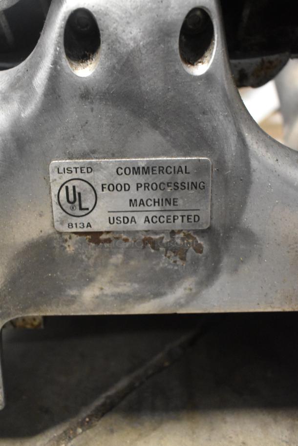 Berkel Commercial Meat Slicer with Blade Sharpener, 115V, 1 Phase, UL listed, USDA accepted. Signs of rust visible.