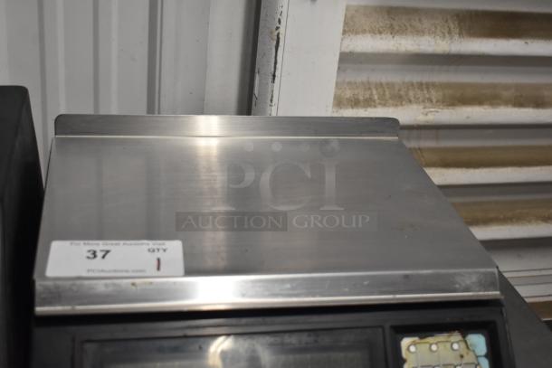 Berkel 522 Commercial Countertop Scale with Label Printer, 120 Volts, 1 Phase. Appears in well-used condition with auction tag.