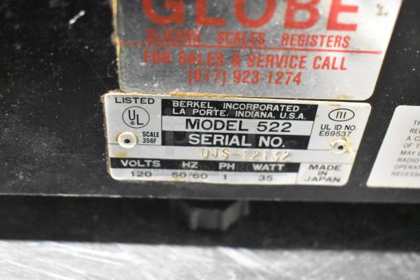 Berkel 522 commercial countertop scale with label printer. Serial DJS-12132, 120V, 1 Phase, 35W, made in Japan.