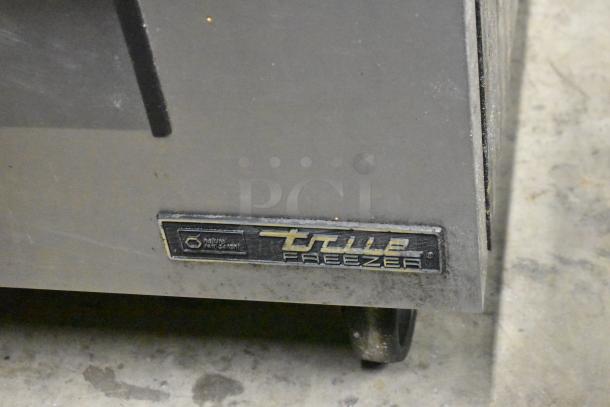 2016 True TUC-27F-D-2-HC undercounter freezer, 2-drawer, on casters. Label shows "True Freezer" brand marking.
