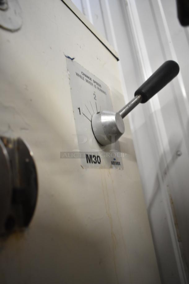 Univex M30 dough mixer speed dial, two settings visible, metallic handle, Univex logo, signs of wear, 115 volts, 1 phase.