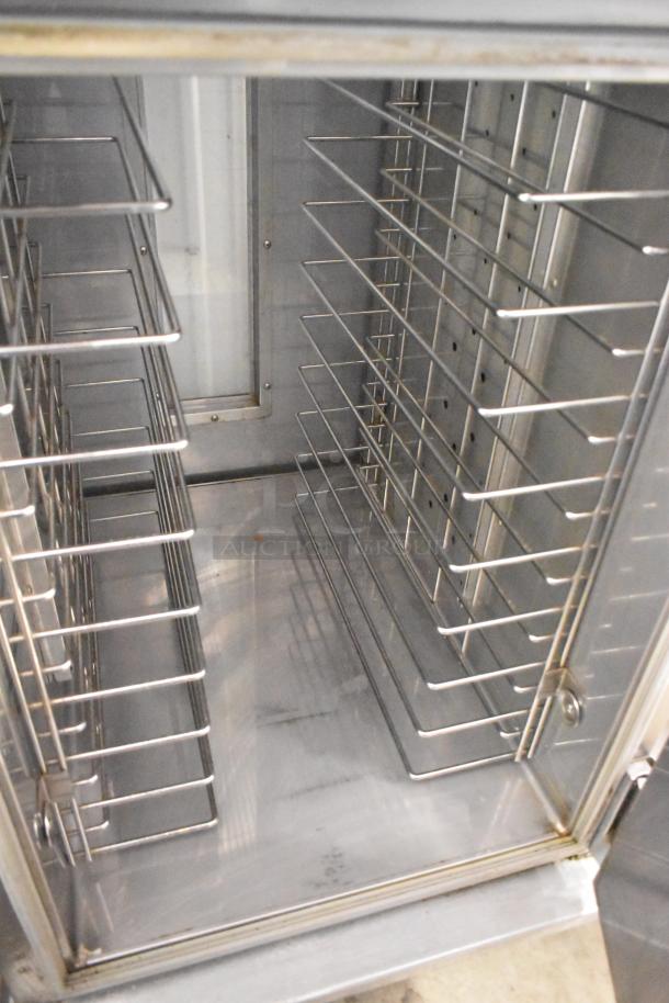 CresCor H138NPS36CLCMQRL insulated hot food holding cabinet with racks, commercial casters, 120V, 1 phase.