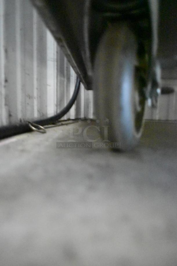 CresCor H138NPS36CLCMQRL hot food holding cabinet, commercial casters, partial view, 120V, 1 Phase.