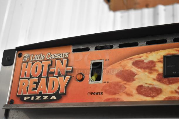 CresCor H138NPS36CLCMQRL hot food holding cabinet, Little Caesars branding visible, model detail unclear.