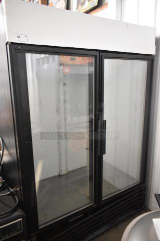True GDM-49 commercial 2-door reach-in cooler merchandiser, 115 volts, 1 phase, glass doors, shelves, clean interior.
