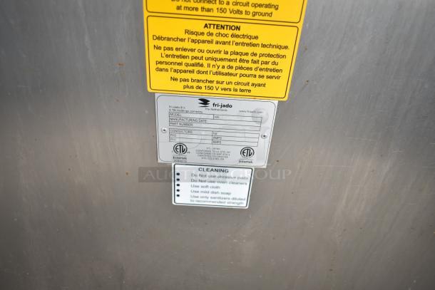 Fri-jado TDR7+7 P rotisserie oven tag detailing model info, safety warnings, and cleaning instructions.