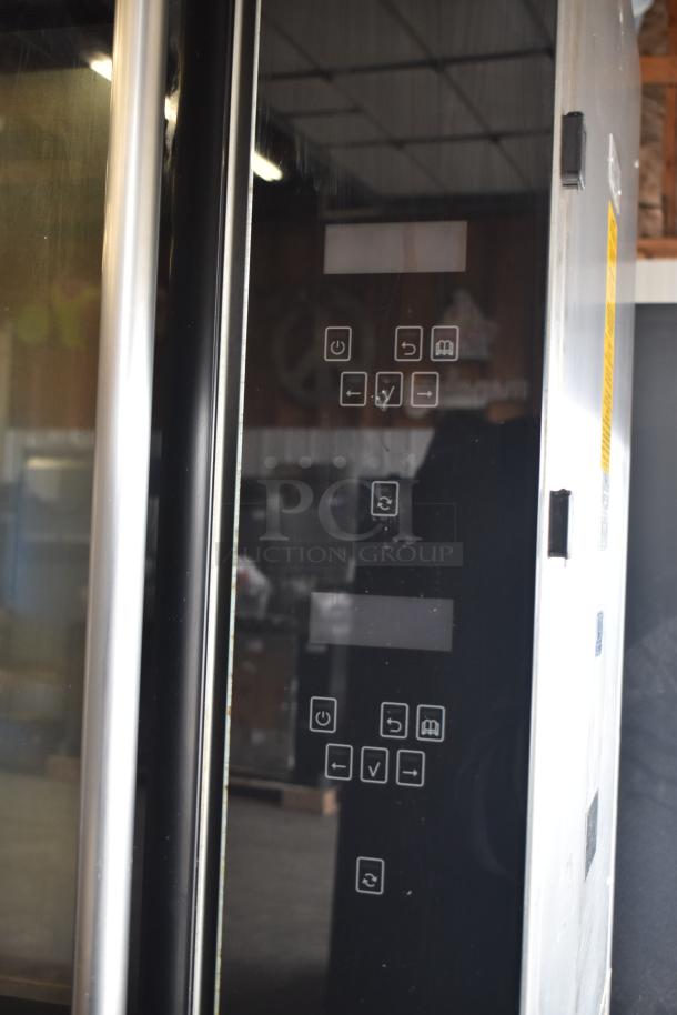 Fri-jado TDR7+7 P rotisserie oven with touchscreen controls, 208V, 3-phase, on commercial casters. Notable broken glass.