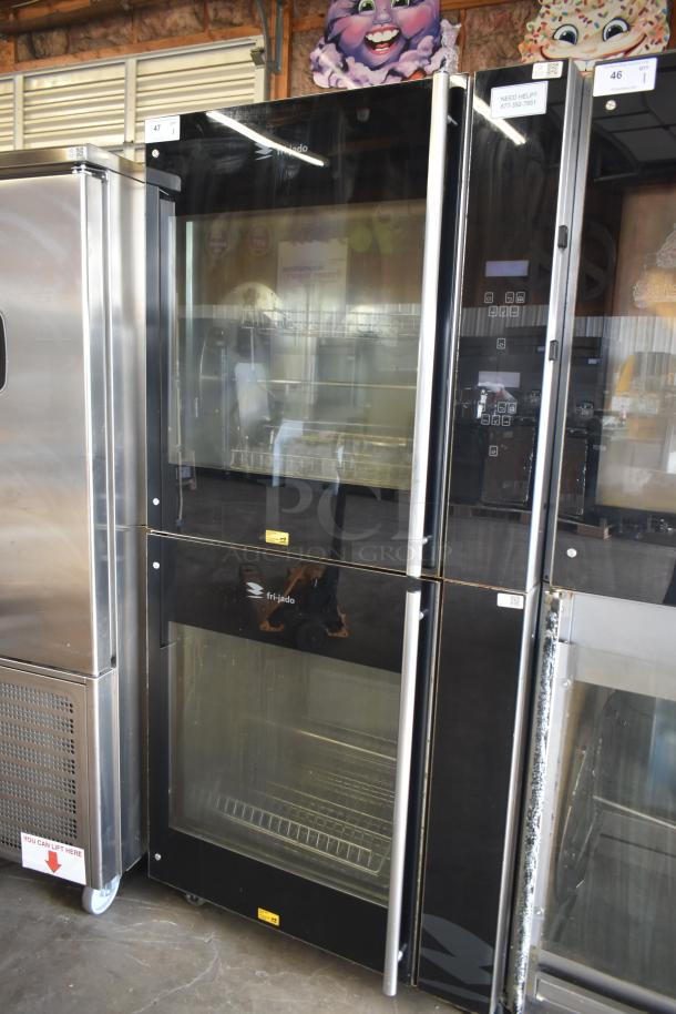 Fri-jado TDR7P commercial rotisserie oven on casters, 208V 3-phase. Features black glass doors, visible branding.