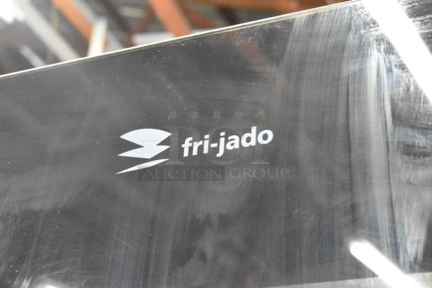 Fri-jado TDR7P rotisserie oven logo detail, commercial-grade stainless steel, electric powered, 208V, 3 phase.