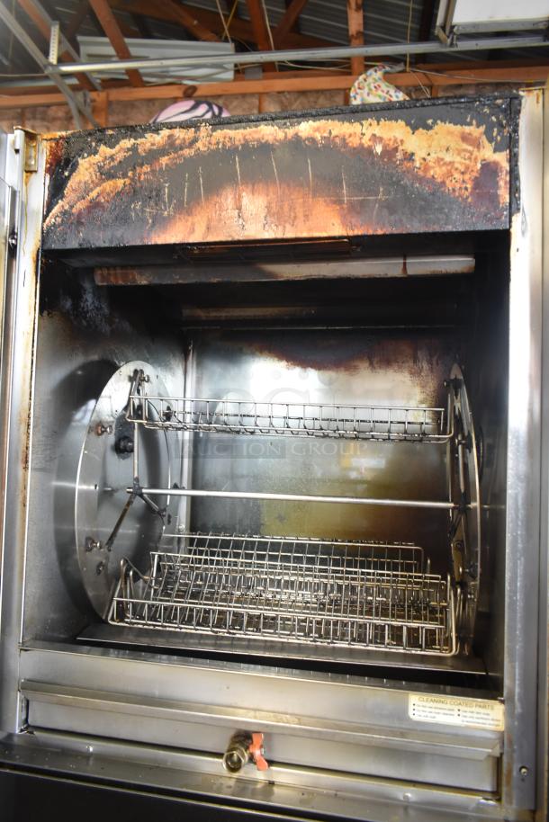 Fri-jado TDR7P electric rotisserie oven, stainless steel interior, gently used, on commercial casters, 208V, 3-phase.