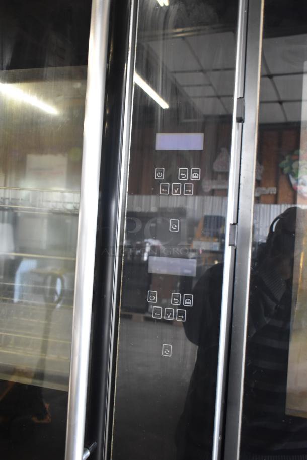 2 Fri-jado TDR7P rotisserie ovens, electric, floor style, on casters. Features digital controls. 208V, 3 Phase.