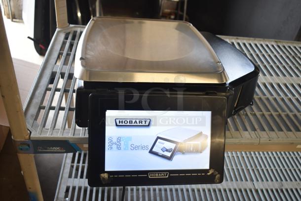 2016 Hobart HTi-7LH commercial countertop scale, metal construction, digital display, tested, working condition.