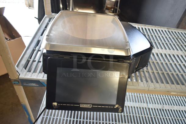 2016 Hobart HTi-7LH countertop food portioning scale, metal, tested working, 120/208-240V, 1 phase, touchscreen.