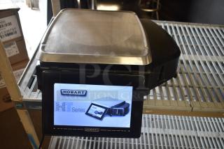 2017 Hobart HTi-7LH26 commercial food portioning scale, stainless steel, digital display, tested, excellent condition.