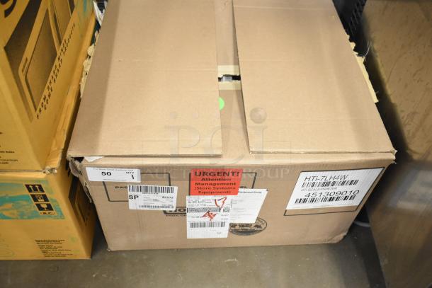 Cardboard box containing a Hobart HTi-7LH26 scale with labels indicating it is a tested, working 2017 model for food portioning.