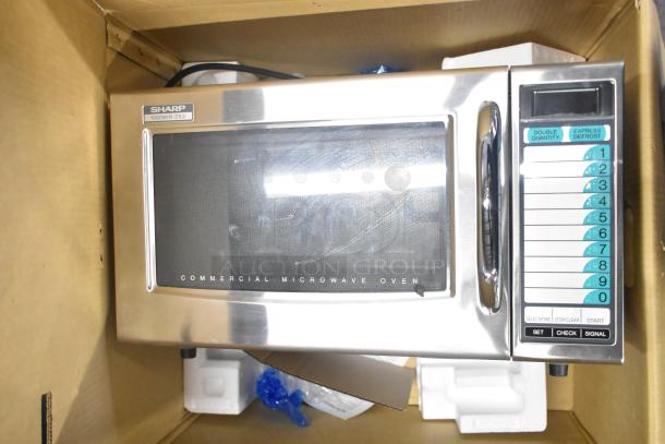 2022 Sharp R-21LVF commercial microwave oven, 120V, 1 phase, showing keypad and stainless steel exterior.