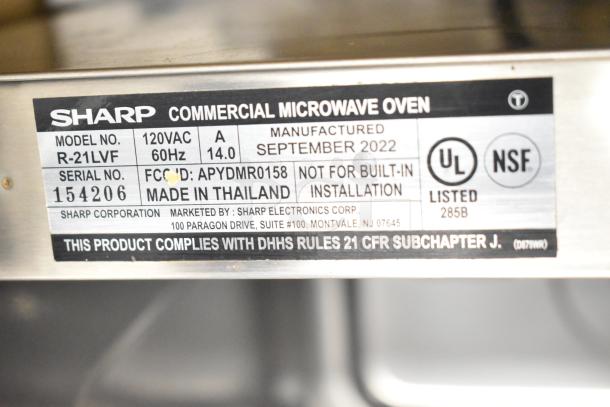 2022 Sharp R-21LVF Commercial Microwave Oven, 120V, 1 Phase. Serial No. 154206, UL and NSF listed, made in Thailand.
