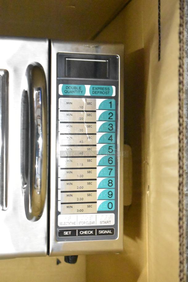 2024 Sharp R-21LVF Commercial Microwave Oven, 120V, 1 Phase, with keypad controls for precise cooking settings.