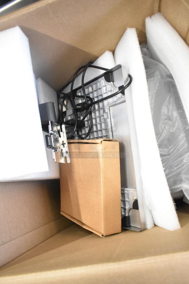 Mettler Toledo FreshWay Scale packaged in a box with foam padding. Visible cords and metal parts. 100-240 Volts, 1 Phase.