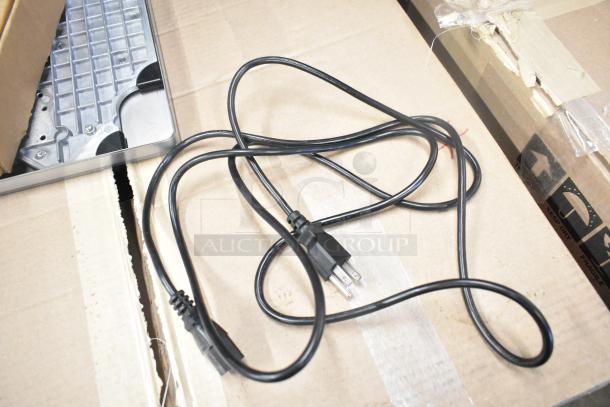 Mettler Toledo FreshWay Scale, partially visible, with standard power cord. Suitable for 100-240 volts, 1 phase.