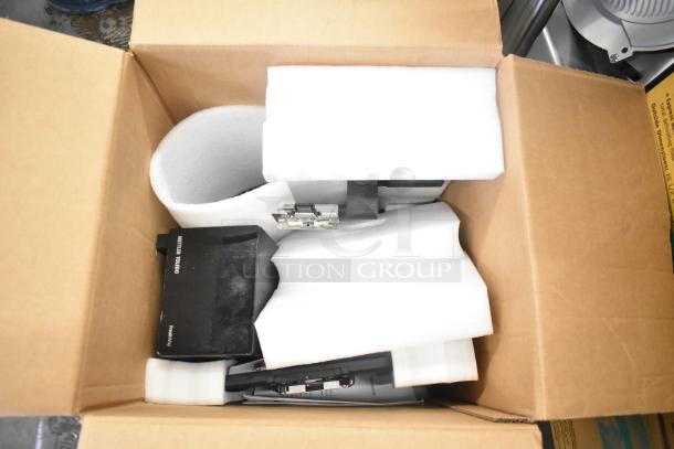 Mettler Toledo FreshWay Scale Set Up in box, featuring components packed with foam. Markings indicate 100-240 Volts, 1 Phase.